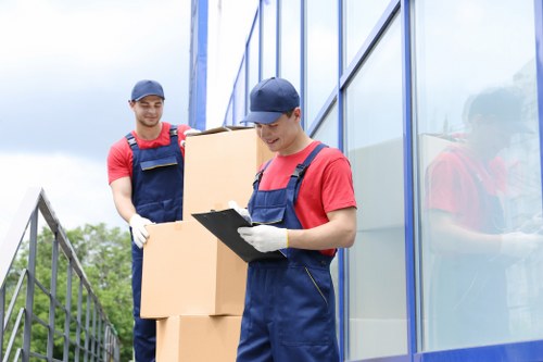 Movers assisting with a residential move in West Kensington