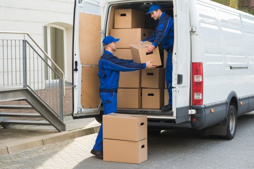 Team planning a removals job near West Kensington station