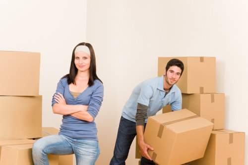 Packed boxes and household items ready for a local removal van
