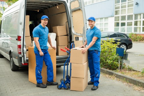 Staff assessing loading and lifting risks in a removals job