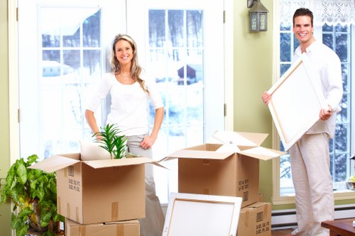 Moving team preparing items for a West Kensington flat relocation