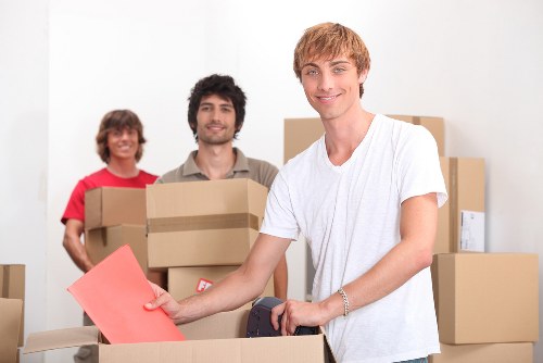 Commercial movers handling office relocation items in West Kensington